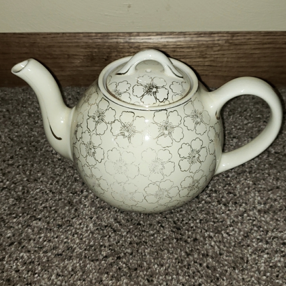 Ivory Ceramic Teapot with Delicate Floral Motif